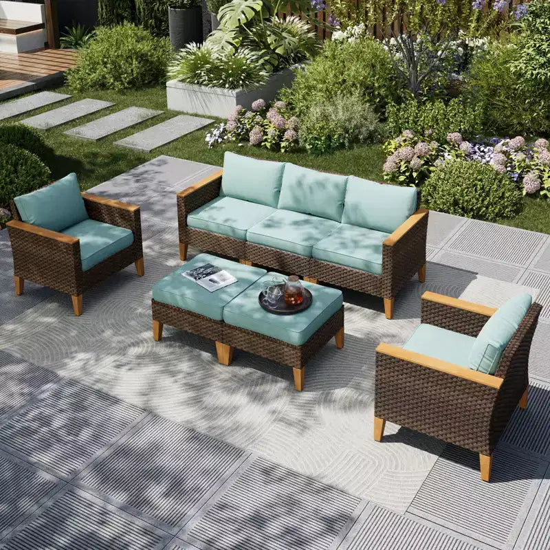 Captiva Designs 7-teiliges Rattan-Sofa-Set für den Außenbereich mit gepolstertem Ottoman