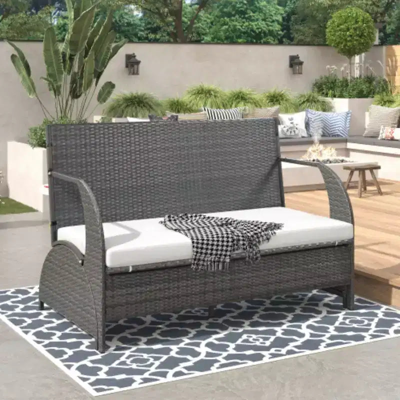 Versatile outdoor loveseat that converts to four seats and a table, suitable for gardens and lawns