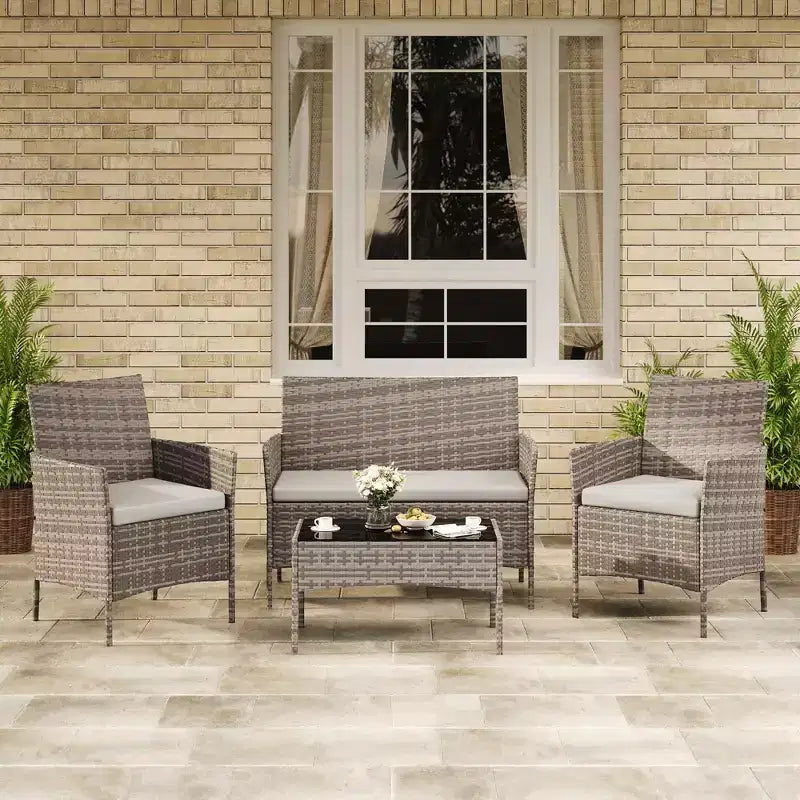 4-teiliges Terrassenmöbel-Set aus Korbgeflecht mit Couchtisch aus Glas, graues Rattan-Sitzgruppe mit waschbaren Kissen für Garten, Veranda und Terrasse