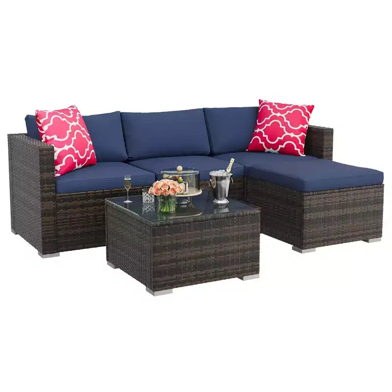 4-teiliges Terrassenmöbel-Set für den Außenbereich, Rattan-Sitzgruppe, Bistro-Gartenmöbel-Set mit 2 Stühlen, weichen Kissen, Zweisitzer-Sofa und 1 Couchtisch aus Glas