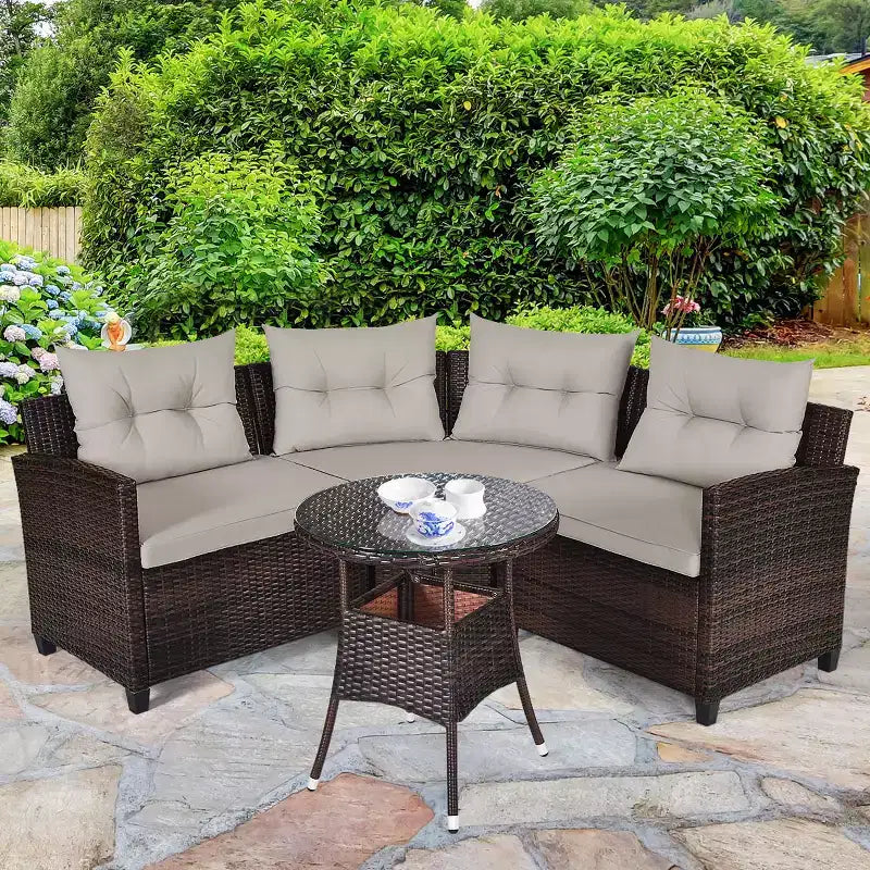 Costway 4-teiliges Outdoor-Gartenmöbel-Set aus Rattan mit gepolstertem Sofa und Tisch