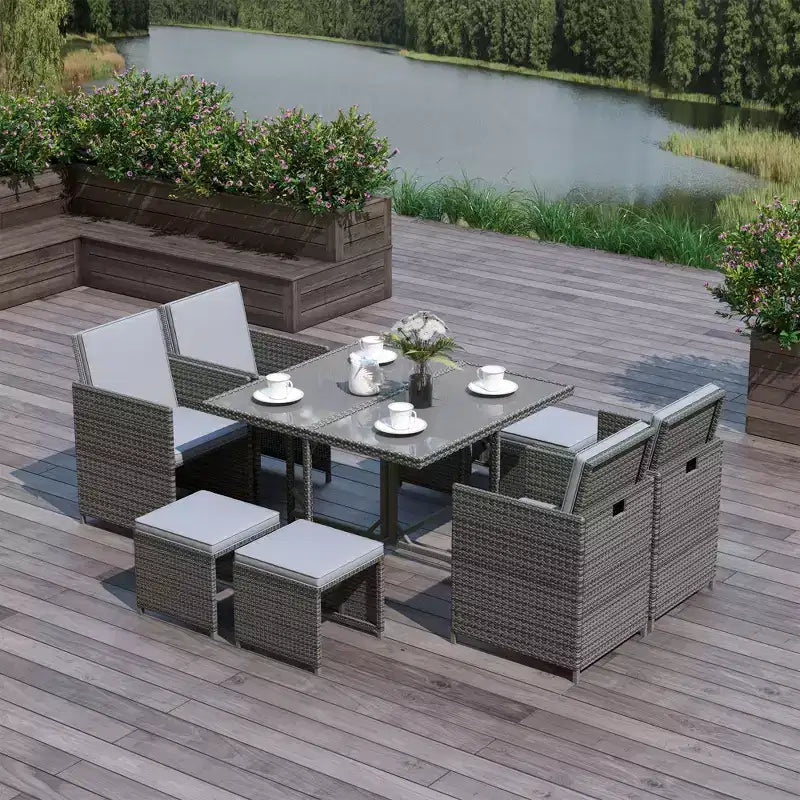 Outsunny 9-teiliges Rattan-Essgruppen-Set, platzsparendes Outdoor-Sofa-Set, mit Esstisch, Ottoman
