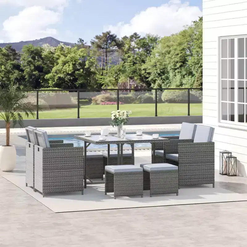Outsunny 9-teiliges Rattan-Essgruppen-Set, platzsparendes Outdoor-Sofa-Set, mit Esstisch, Ottoman