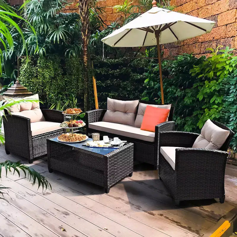 Costway 4-teiliges Outdoor-Rattan-Garnitur gepolstertes Sofa Armlehnentisch