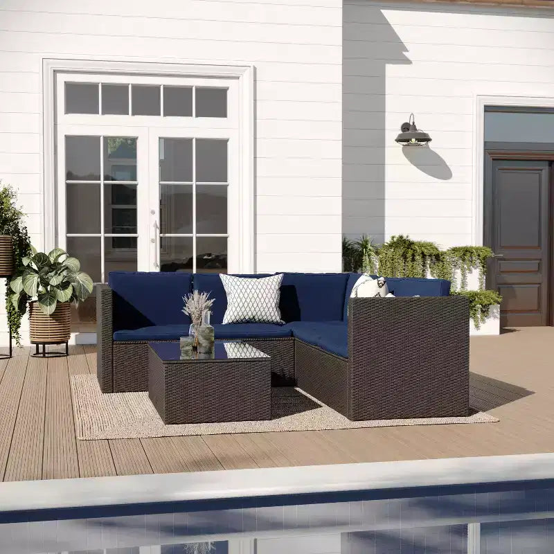 Merrick Lane All Weather PE Rattan Sectional Sofa with Coffee Table and Included Cushions